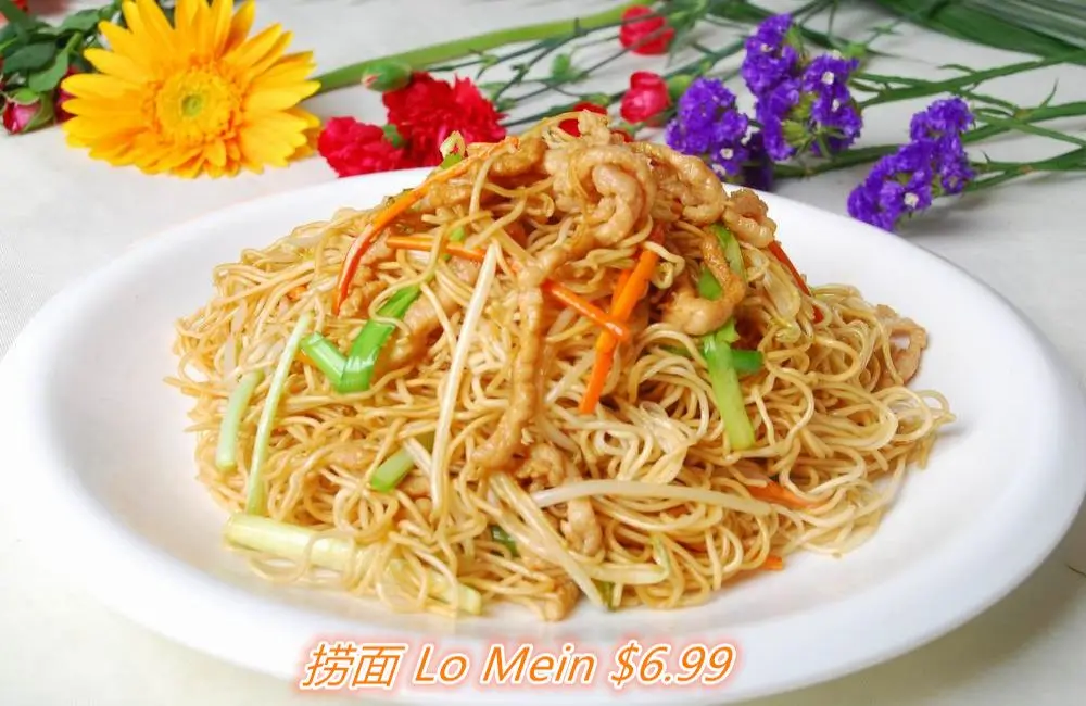 Savory stir-fried noodles with pork and veggies at Chuanyu Fusion, a Chinese Restaurant in Oklahoma City